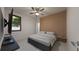 Bedroom with wood accent wall and mounted TV at 18040 Quincy Ave, Port Charlotte, FL 33948