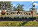 Entrance to Sorrento East, a deed-restricted community, with gate access at 207 Rubens Dr # D, Nokomis, FL 34275