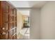 Interior view of condo's entryway and screened patio at 207 Rubens Dr # D, Nokomis, FL 34275