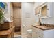Bathroom with shower, vanity, and granite countertop at 2127 Lusitania Dr, Sarasota, FL 34231