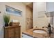Bathroom with a shower and granite countertop at 2127 Lusitania Dr, Sarasota, FL 34231
