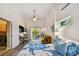Bedroom with a view, comfortable seating, and a desk at 2127 Lusitania Dr, Sarasota, FL 34231