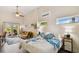 Bright bedroom with comfortable bed and access to patio at 2127 Lusitania Dr, Sarasota, FL 34231
