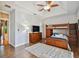 Bedroom with a bunk bed, hardwood floors, and plenty of natural light at 2127 Lusitania Dr, Sarasota, FL 34231