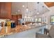 Large kitchen island with seating and granite countertops at 2127 Lusitania Dr, Sarasota, FL 34231