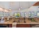 Kitchen with granite countertops, double sink, and view to backyard at 2127 Lusitania Dr, Sarasota, FL 34231