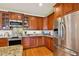 Modern kitchen with stainless steel appliances and granite counters at 2127 Lusitania Dr, Sarasota, FL 34231