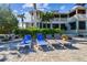 Relaxing patio with lounge chairs near waterfront home at 2127 Lusitania Dr, Sarasota, FL 34231