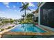 Modern infinity pool with a view of the canal at 2127 Lusitania Dr, Sarasota, FL 34231
