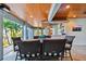 Outdoor dining area with wicker chairs and a wet bar at 2127 Lusitania Dr, Sarasota, FL 34231