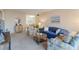 Living room features a neutral color palette and plenty of natural light at 3267 Beneva Rd # 103, Sarasota, FL 34232