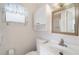 Clean bathroom with white vanity, toilet, and shower at 3403 Overcup Oak Ter, Sarasota, FL 34237