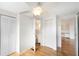 Spacious bedroom with wood floors and access to a small bathroom at 3403 Overcup Oak Ter, Sarasota, FL 34237