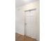 Interior view of a white door with a half-moon window at 3403 Overcup Oak Ter, Sarasota, FL 34237