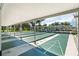 Covered outdoor shuffleboard courts with green playing surfaces at 3403 Overcup Oak Ter, Sarasota, FL 34237