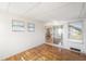 Bright sunroom with hardwood floors and access to the outdoors at 3403 Overcup Oak Ter, Sarasota, FL 34237