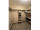Walk-in closet with shelves and hanging rods at 3455 Gardenia St, Sarasota, FL 34237