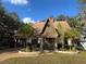 A-frame home with stone accents and landscaping at 3455 Gardenia St, Sarasota, FL 34237