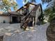 Back exterior showcasing stairs and patio at 3455 Gardenia St, Sarasota, FL 34237