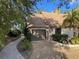 Home's garage and walkway, with brick pavers at 3455 Gardenia St, Sarasota, FL 34237