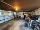 Spacious garage with workbench and storage at 3455 Gardenia St, Sarasota, FL 34237