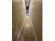 Long hallway with light gray wood-look flooring at 3455 Gardenia St, Sarasota, FL 34237