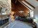 Living room with stone fireplace and wood accents at 3455 Gardenia St, Sarasota, FL 34237
