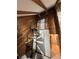 Unique spiral staircase leading to an upper loft area at 3455 Gardenia St, Sarasota, FL 34237