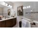 Spa-like bathroom with double vanity, a large shower and neutral colors at 4420 Tamarind Pl, Bradenton, FL 34203