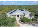 Large home with solar panels and a waterfront lot at 4678 Silent Creek Way, Nokomis, FL 34275