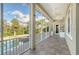 Spacious screened porch overlooking pool and lush landscape at 4678 Silent Creek Way, Nokomis, FL 34275