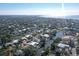 Aerial view of a house by the water, showcasing its location at 5072 Higel Ave, Sarasota, FL 34242