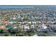 Wide aerial showcasing the property and its waterfront location at 5072 Higel Ave, Sarasota, FL 34242