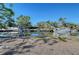 Wide canal front view with boat lifts and neighboring properties at 5072 Higel Ave, Sarasota, FL 34242