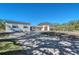 Updated home exterior, featuring a paver driveway at 5072 Higel Ave, Sarasota, FL 34242