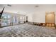 Renovation project: sunlit living room with access to patio at 5072 Higel Ave, Sarasota, FL 34242