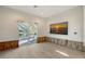 Living room with water views and new flooring, currently under renovation at 5072 Higel Ave, Sarasota, FL 34242