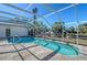 Screened pool and patio with canal view at 5072 Higel Ave, Sarasota, FL 34242