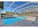 Screened pool and patio with canal view at 5072 Higel Ave, Sarasota, FL 34242