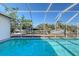 Screened pool with canal view and patio at 5072 Higel Ave, Sarasota, FL 34242