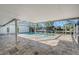 Screened pool and patio with canal view at 5072 Higel Ave, Sarasota, FL 34242