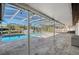Screened pool and patio with canal view at 5072 Higel Ave, Sarasota, FL 34242