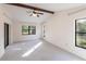 Bright and airy bedroom with neutral carpeting and natural light at 5131 Willow Leaf Dr, Sarasota, FL 34241