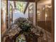 Serene courtyard with a water feature and lush landscaping at 5131 Willow Leaf Dr, Sarasota, FL 34241