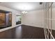 Dining room with dark hardwood floors and window view at 5131 Willow Leaf Dr, Sarasota, FL 34241
