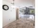 View from dining room to living room with fireplace at 5131 Willow Leaf Dr, Sarasota, FL 34241