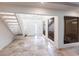 Spacious entryway with tile floors and a staircase at 5131 Willow Leaf Dr, Sarasota, FL 34241