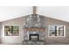 Stone fireplace with wood-paneled accent wall at 5131 Willow Leaf Dr, Sarasota, FL 34241