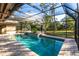 Relaxing screened pool with lush landscaping at 5131 Willow Leaf Dr, Sarasota, FL 34241