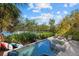 Inviting pool and spa with water views at 5246 Avenida Del Mare, Sarasota, FL 34242